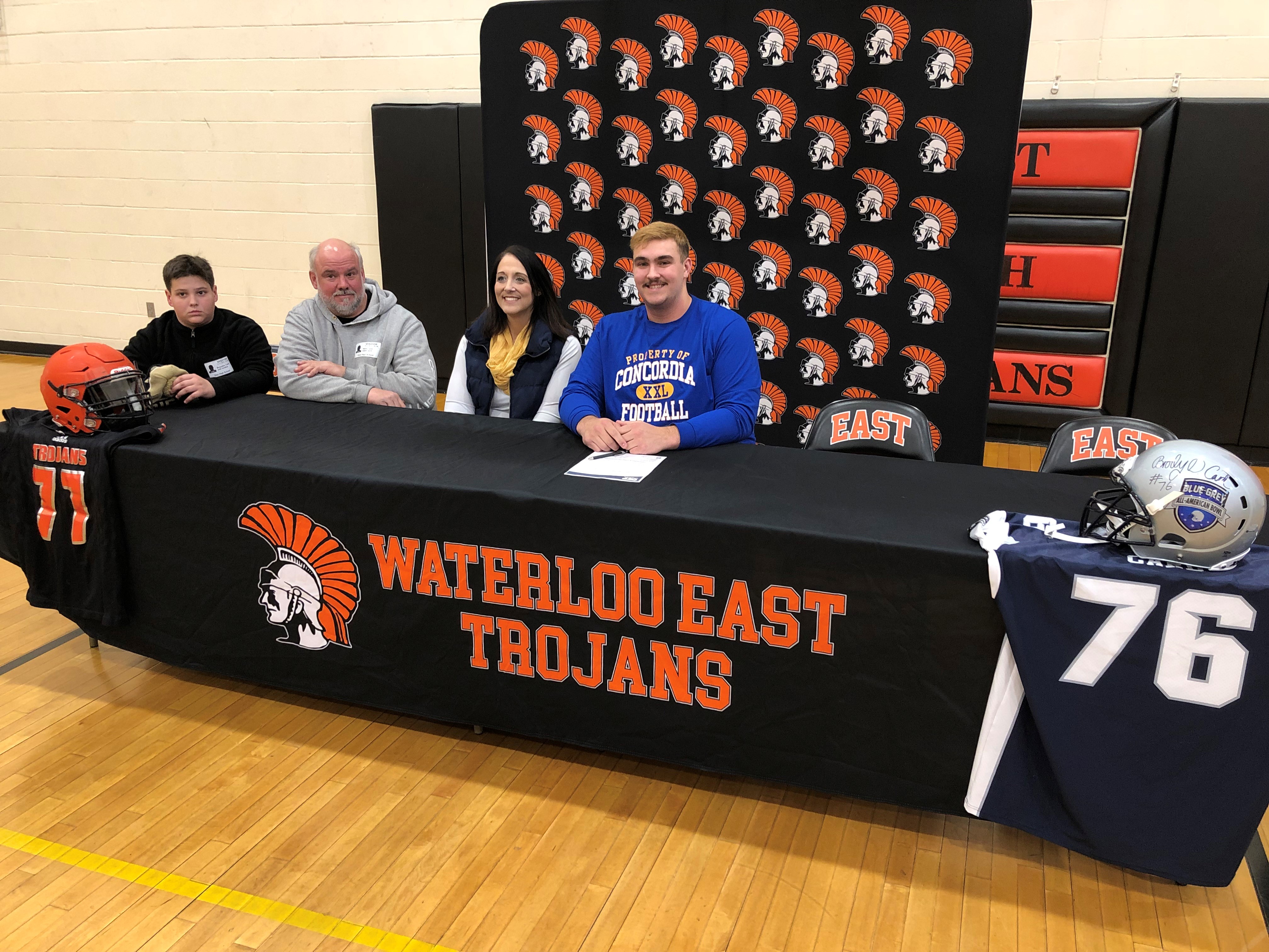 Brody Card signing his letter of intent