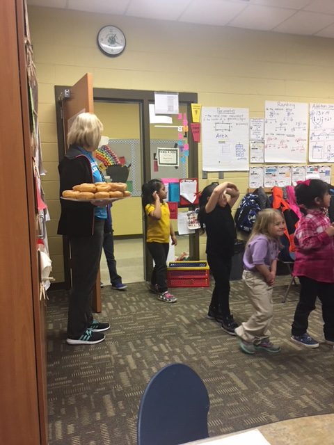 Mrs. Hummel's Kindergarten class motivating 3rd grade students for Iowa Assessments