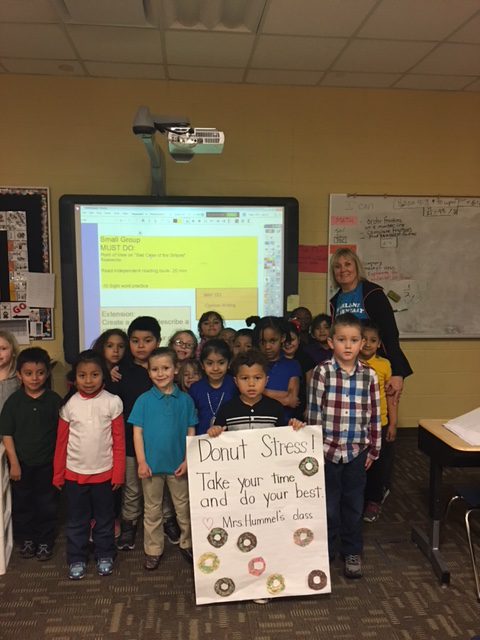 Mrs. Hummel's Kindergarten class motivating 3rd grade students for Iowa Assessments